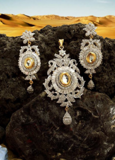 Diamond necklace and earrings set on rock – jewellery photography