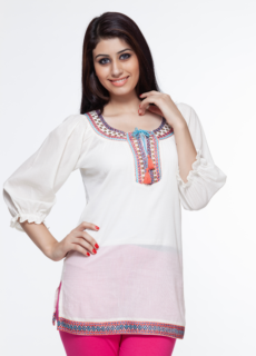 Woman in white embellished tunic top – ecommerce womenswear photography