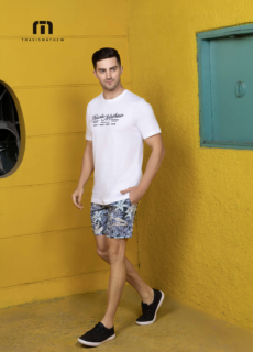 Male model in white t-shirt and printed shorts – menswear lookbook
