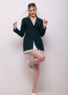 Woman in dark green blazer dress, posed – fashion ecommerce photography