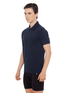 Male model in navy polo t-shirt and black shorts – ecommerce apparel photography