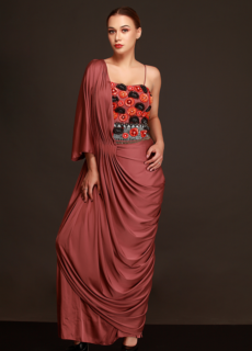 Model in rust pre-draped saree – designer wear photoshoot