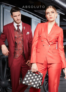 Male model in red suit and woman in red pantsuit – fashion brand campaign