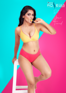 Model in yellow and pink lingerie set on a bright backdrop – lingerie campaign