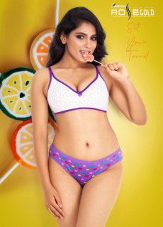 Model in white and purple lingerie set with fruit backdrop – lingerie campaign