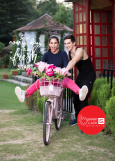 Couple with a flower-basket bicycle – lifestyle apparel campaign