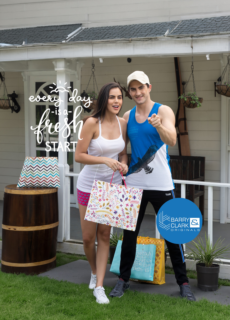 Couple with shopping bags outside a cafe – lifestyle apparel campaign