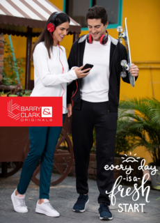 Couple in white and black outfits outdoors – lifestyle apparel campaign
