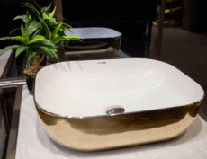 Gold and white countertop wash basin – bathroom product photography