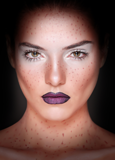 Close-up beauty portrait of model with purple lips
