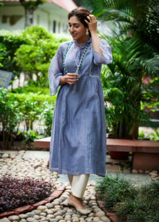 Woman in blue kurta in a garden – ethnic wear photoshoot