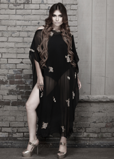 Model in black embroidered sheer outfit – fashion editorial photoshoot