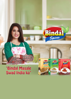 Woman holding spice packets – Bindal Masale food brand advertising shoot