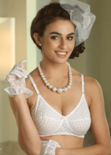 Model in white bra with pearl necklace – lingerie photoshoot